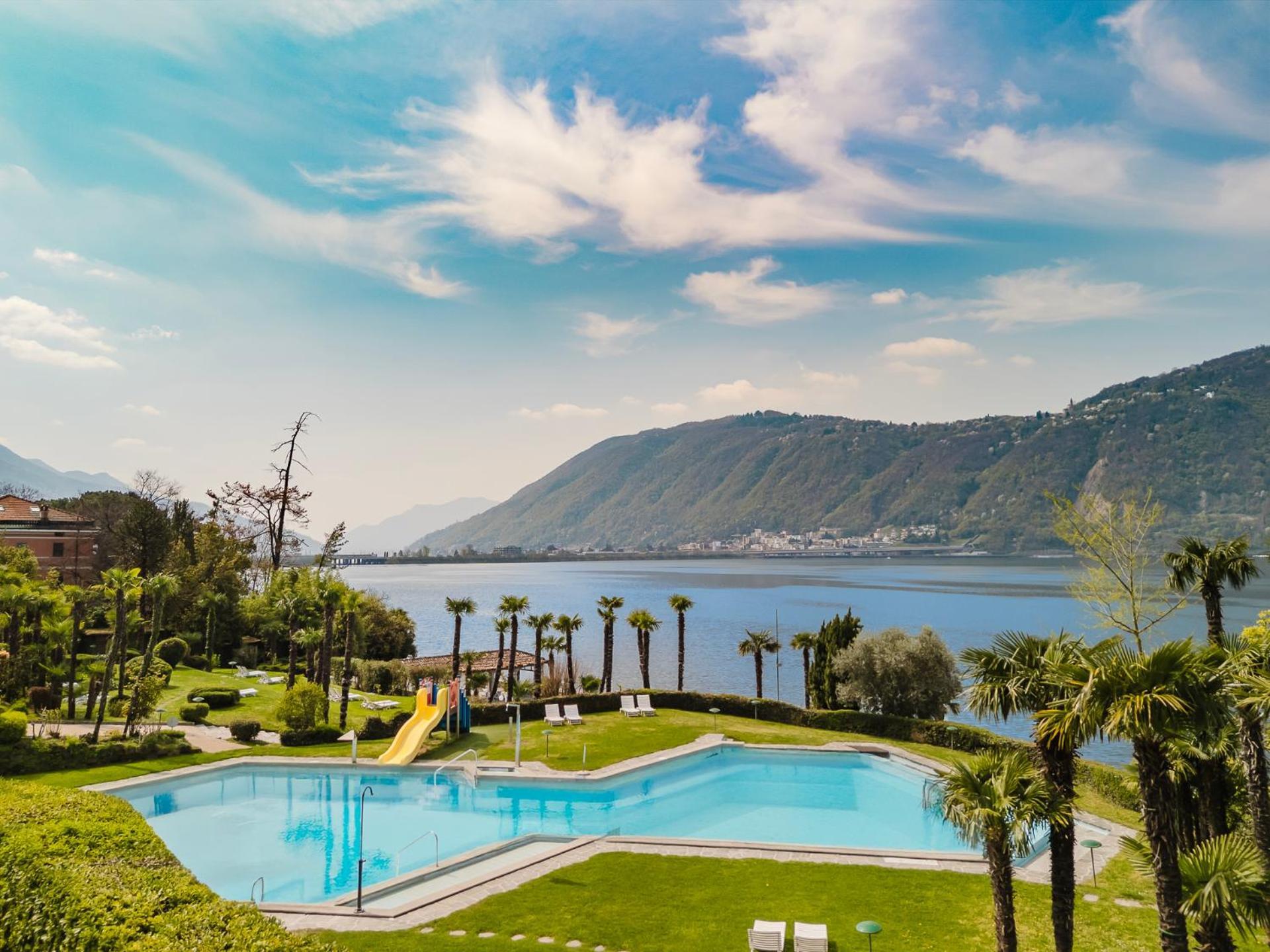 Luganersee, Pool, Strand, Parkplatz, Suite 204 Биссоне Экстерьер фото